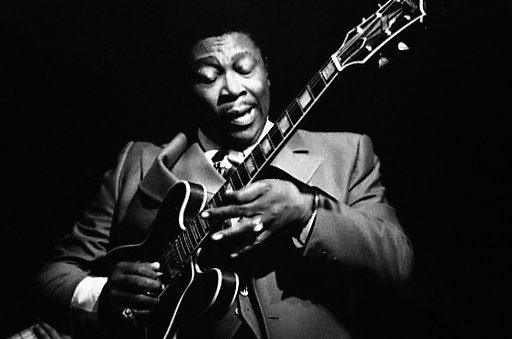 B.B. King vibrating a note on his trademark guitar, Lucille