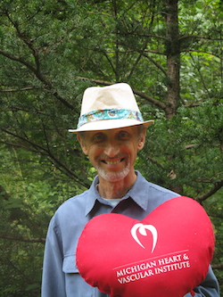 Laz with his "Heart Buddy" pillow from the hospital